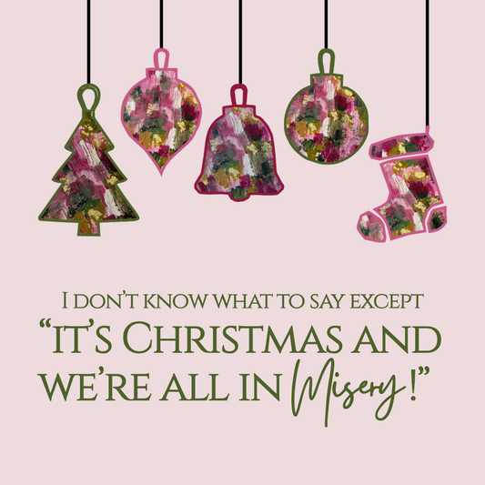 Christmas paper coaster reading ‘We’re All in Misery’ over Very Berry Christmas abstract art